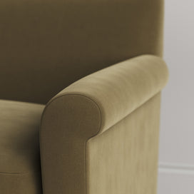 Close-up of the tailored armrest on the Sepia velvet Idler by Nix.