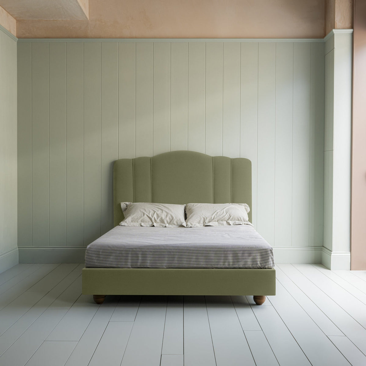 King Size Cloud Nine Upholstered Bed in Intelligent Velvet Green Tea front view with mattress and pillows.