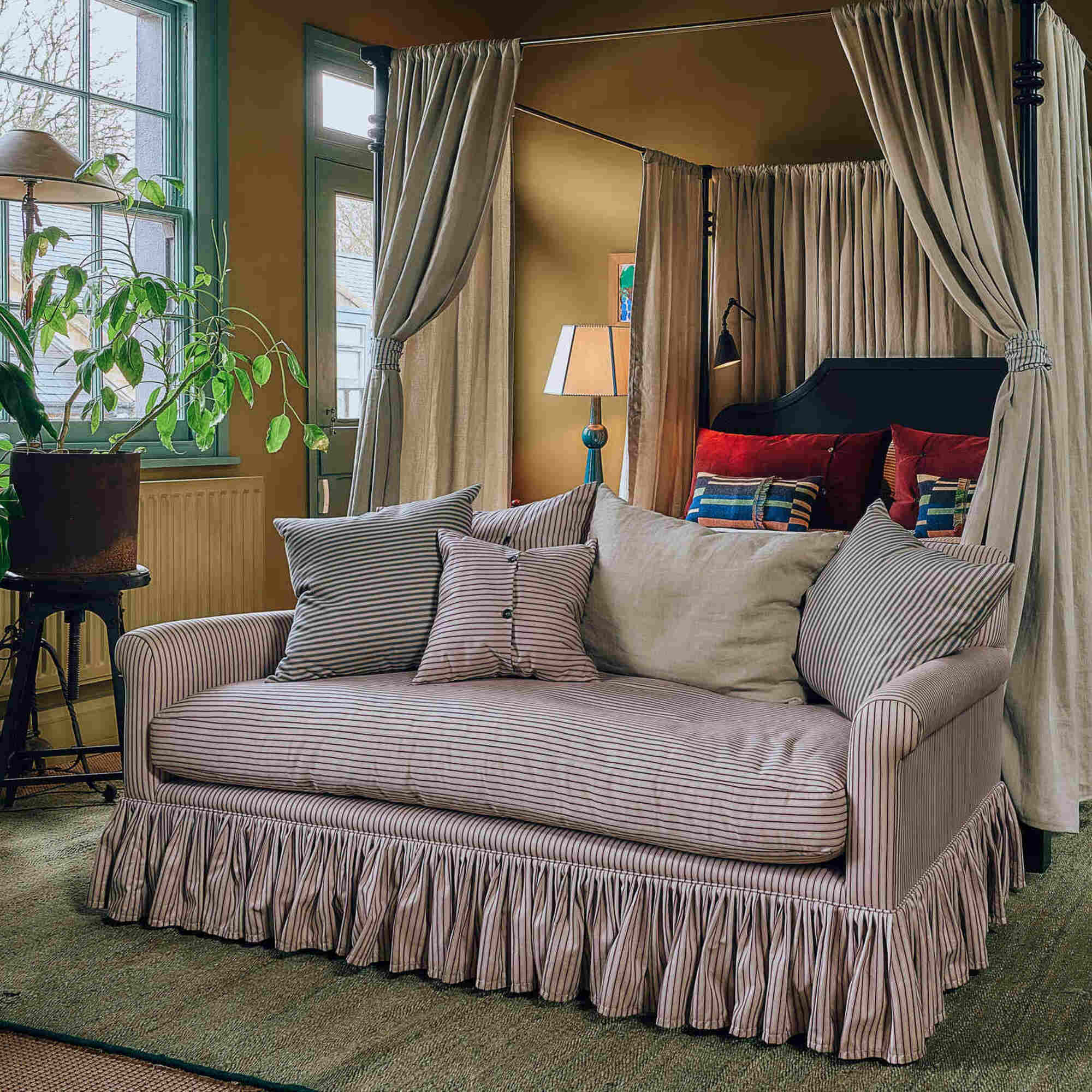  Curtain Call 2 Seater Sofa styled in a bohemian bedroom setting by Nicola Harding interiors 