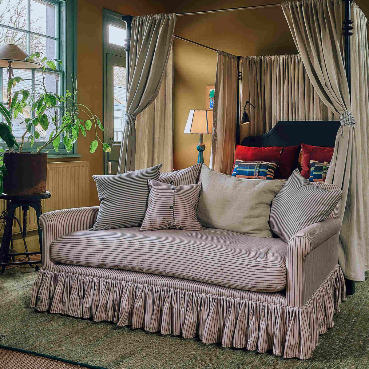 Curtain Call 2 Seater Sofa styled in a bohemian bedroom setting by Nicola Harding interiors