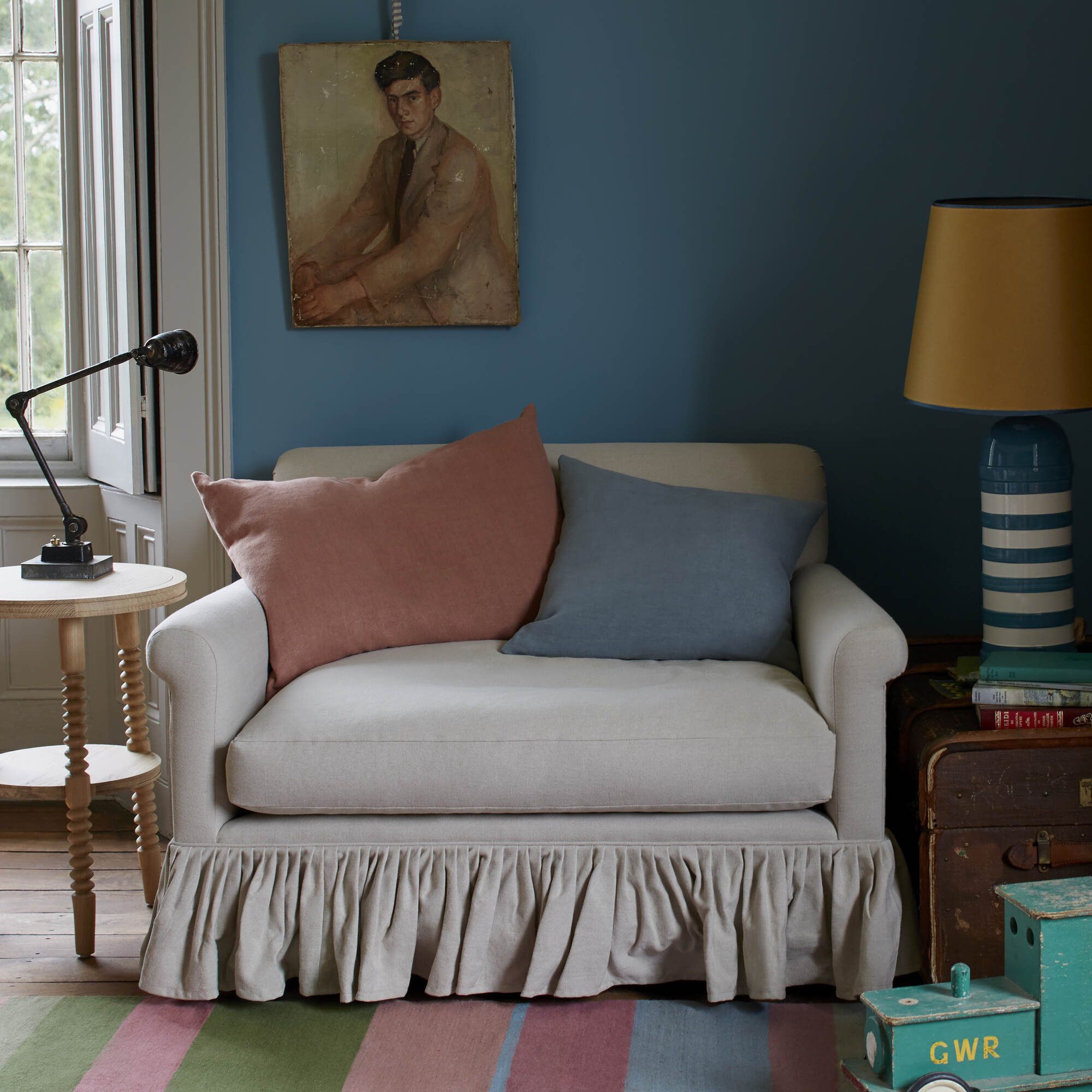  Nicola Harding & Co elegant ticking stripe small sofa reading nook arrangement. 