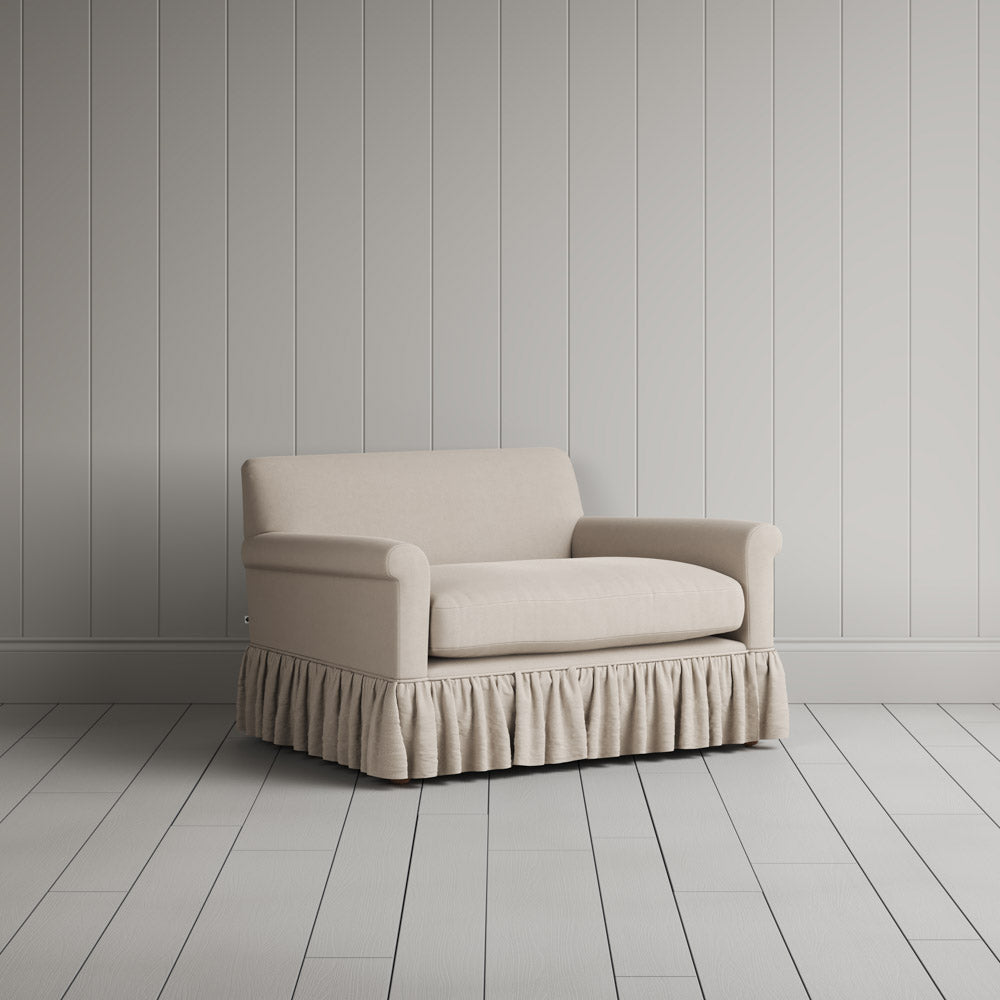 Curtain Call Love Seat skirted small sofa in laidback linen dove, angled view by NiX.
