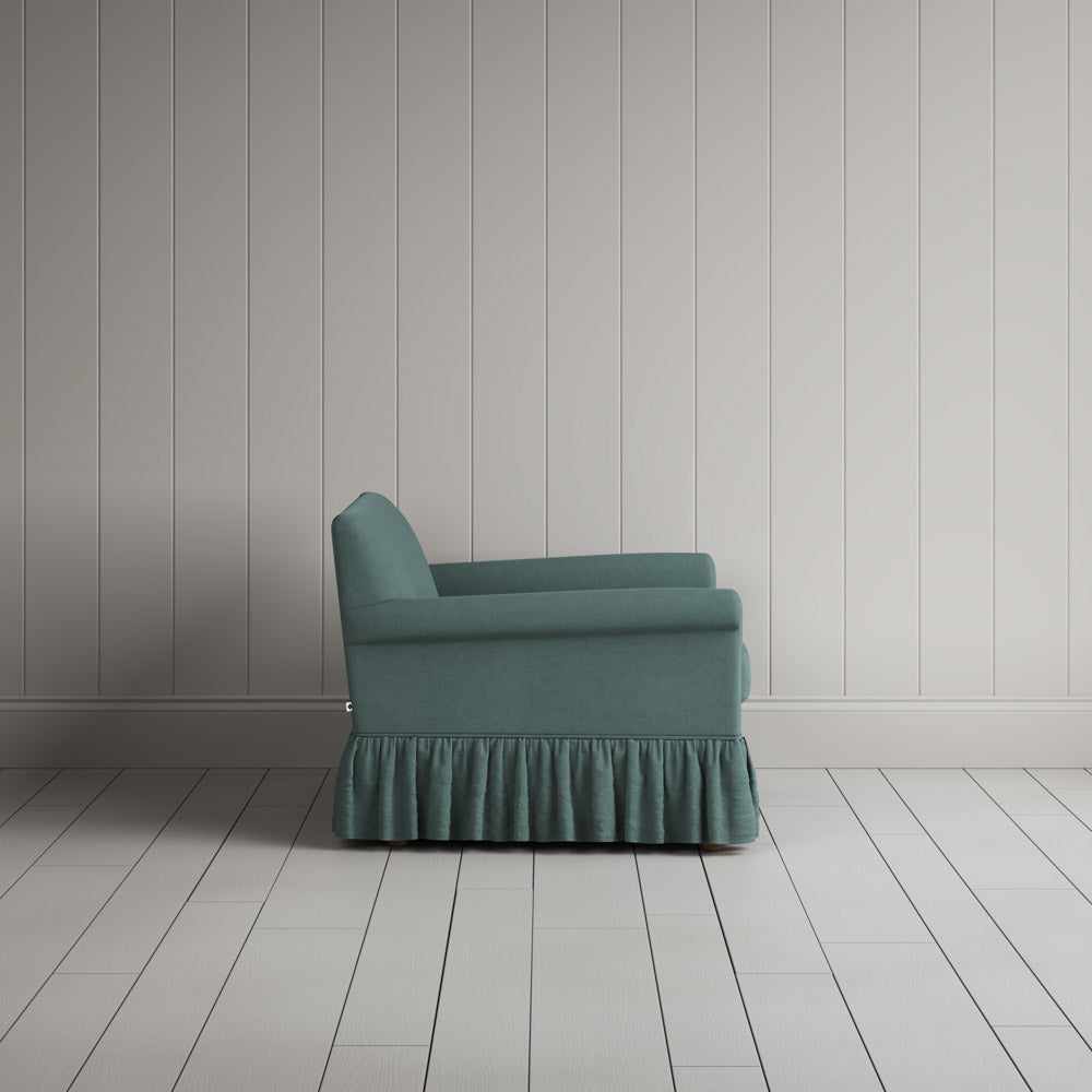 Curtain Call Love Seat in laidback linen sea teal, side profile view showing silhouette. 