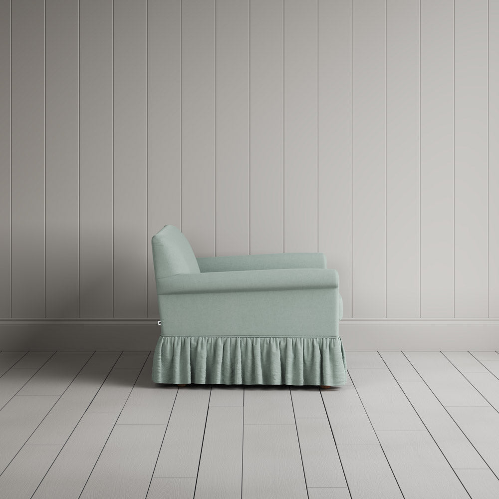 Curtain Call Love Seat in laidback linen mineral, side profile view showing silhouette. 