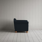 Side Profile of Black Dolittle Love Seat in Laidback Linen