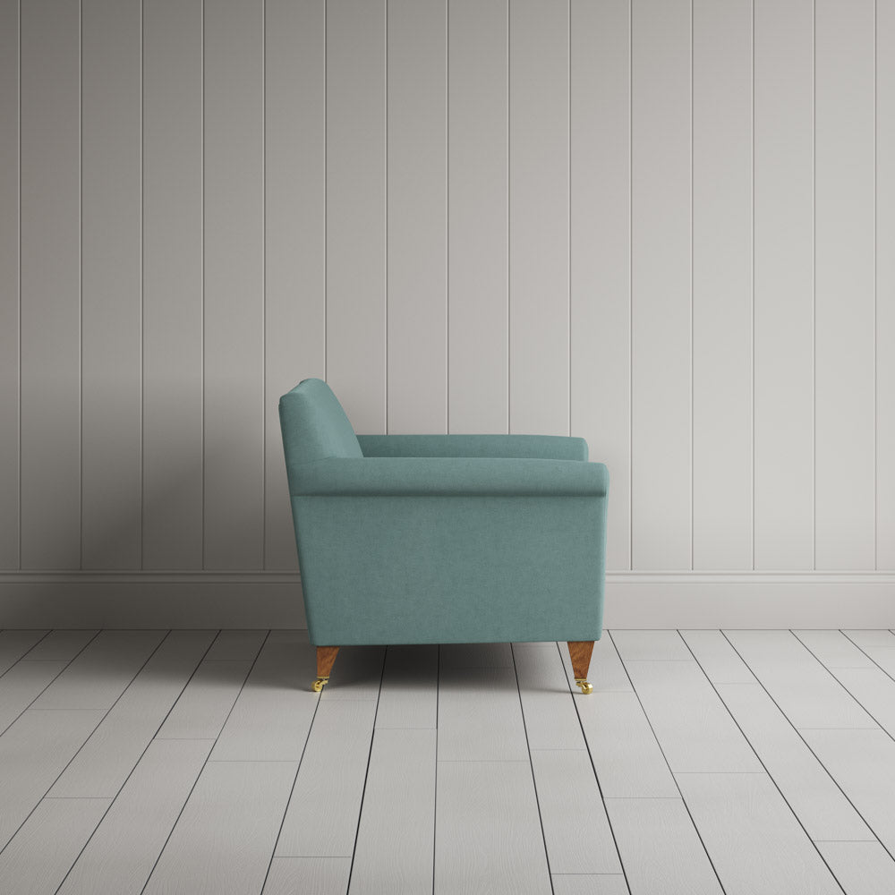 Side profile of Idler Love Seat in Laidback Linen Cerulean