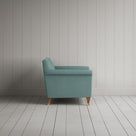 Side profile of Idler Love Seat in Laidback Linen Cerulean