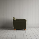 Side profile of the Caper green corduroy Dolittle love seat
