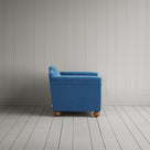 Side profile of the Harbour Blue corduroy Dolittle love seat