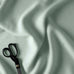 image of Hither Hexagonal Ottoman in Laidback Linen Sky