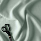 Hither Hexagonal Ottoman in Laidback Linen Sky - Nicola Harding