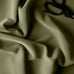 image of Hither Hexagonal Ottoman in Intelligent Velvet Green Tea