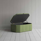 Striped storage ottoman in green and white, ideal for keeping your belongings neat and tidy.