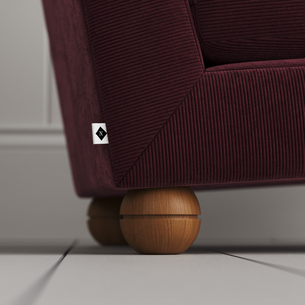  Perch Armchair close-up detail of the playful spherical timber foot by NiX. 