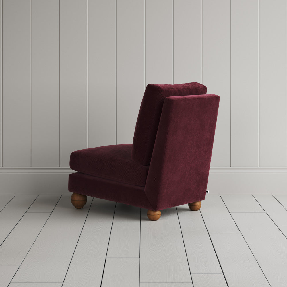 Perch Armchair cherry corduroy, rear angled view by Nicola Harding.