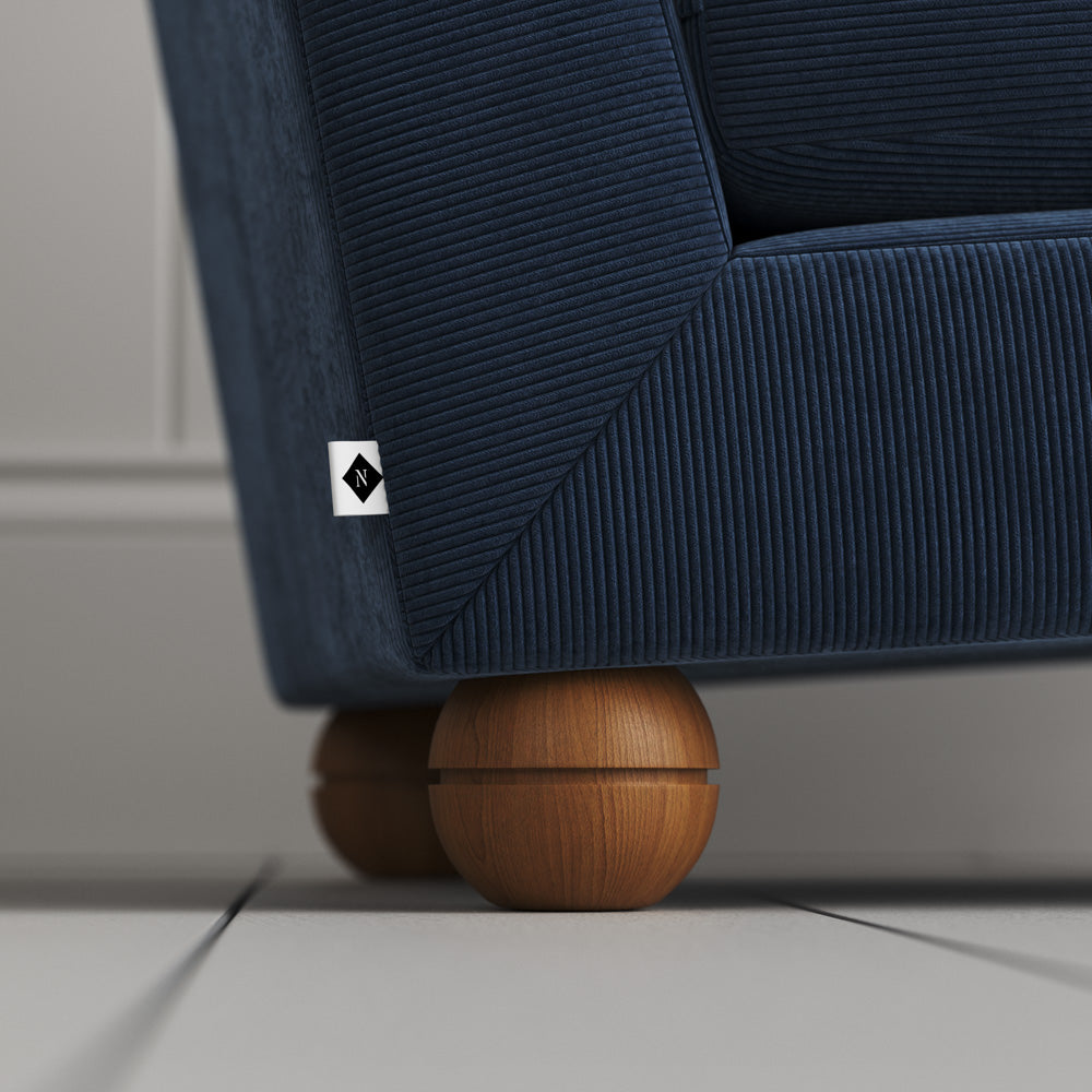 Perch Armchair close-up detail of the playful spherical timber foot by NiX.