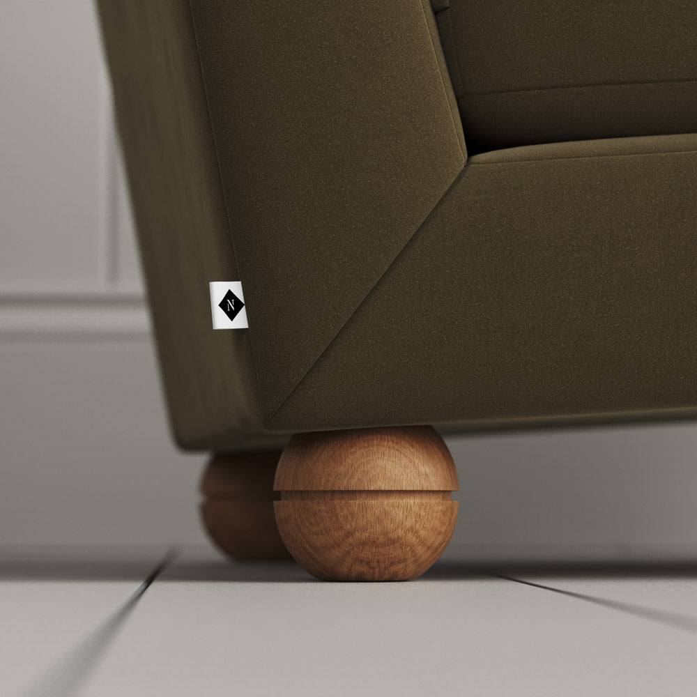 Upholstered Armchair with round wooden feet