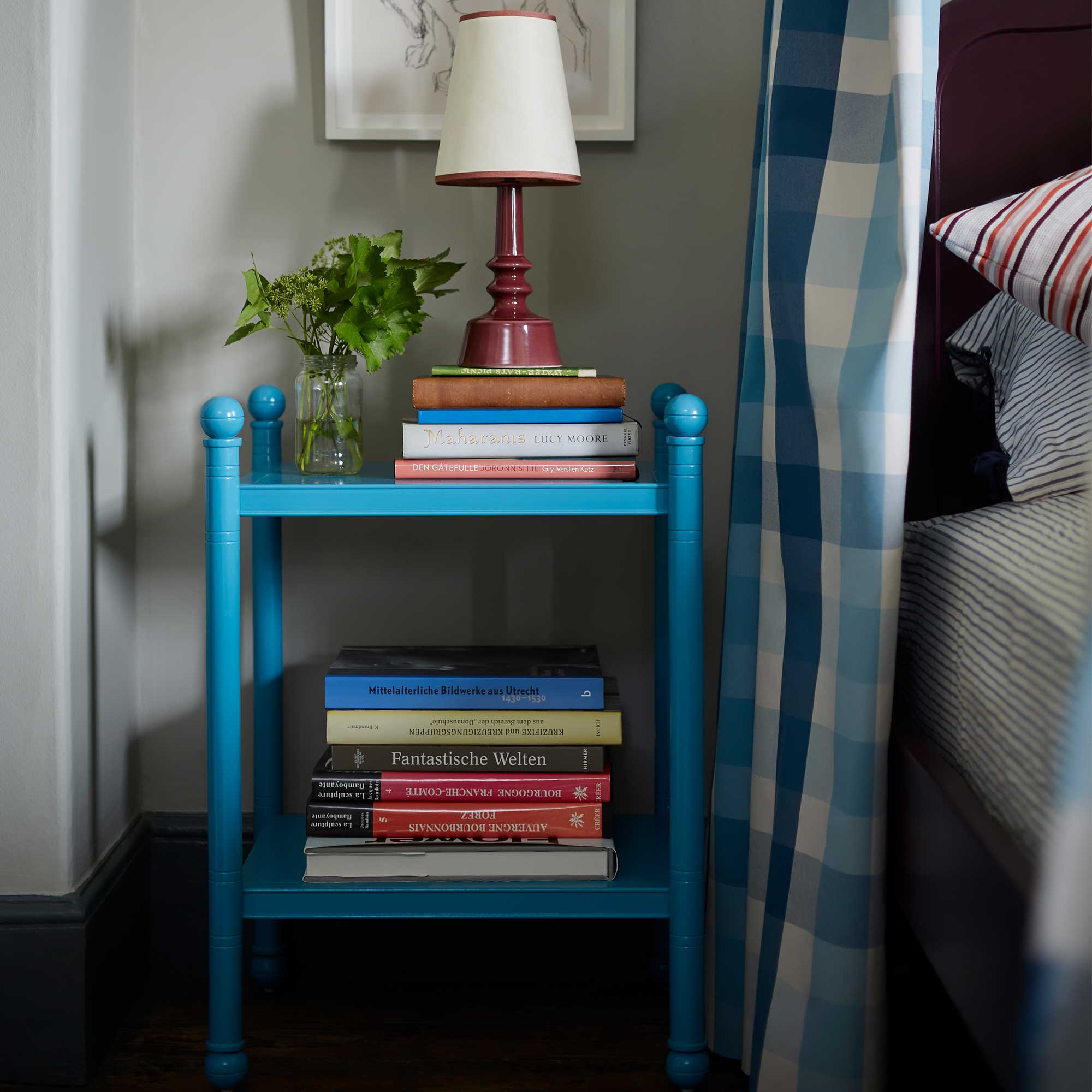  Revive Side Table, Cerulean Blue, With Bunch of Books on Both Shelfs with a Side Table Lamp - By NiX Luxury Furniture 