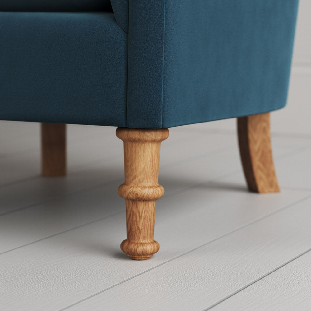 Time Out Armchair close-up detail of the turned timber front legs by NiX.