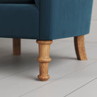Time Out Armchair close-up detail of the turned timber front legs by NiX.
