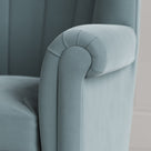 NiX design intelligent velvet fabric upholstered armchair arm detail shot.