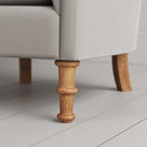 Time Out Armchair close-up detail of the turned timber front legs by NiX.