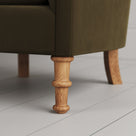 Time Out Armchair close-up detail of the turned timber front legs by NiX.