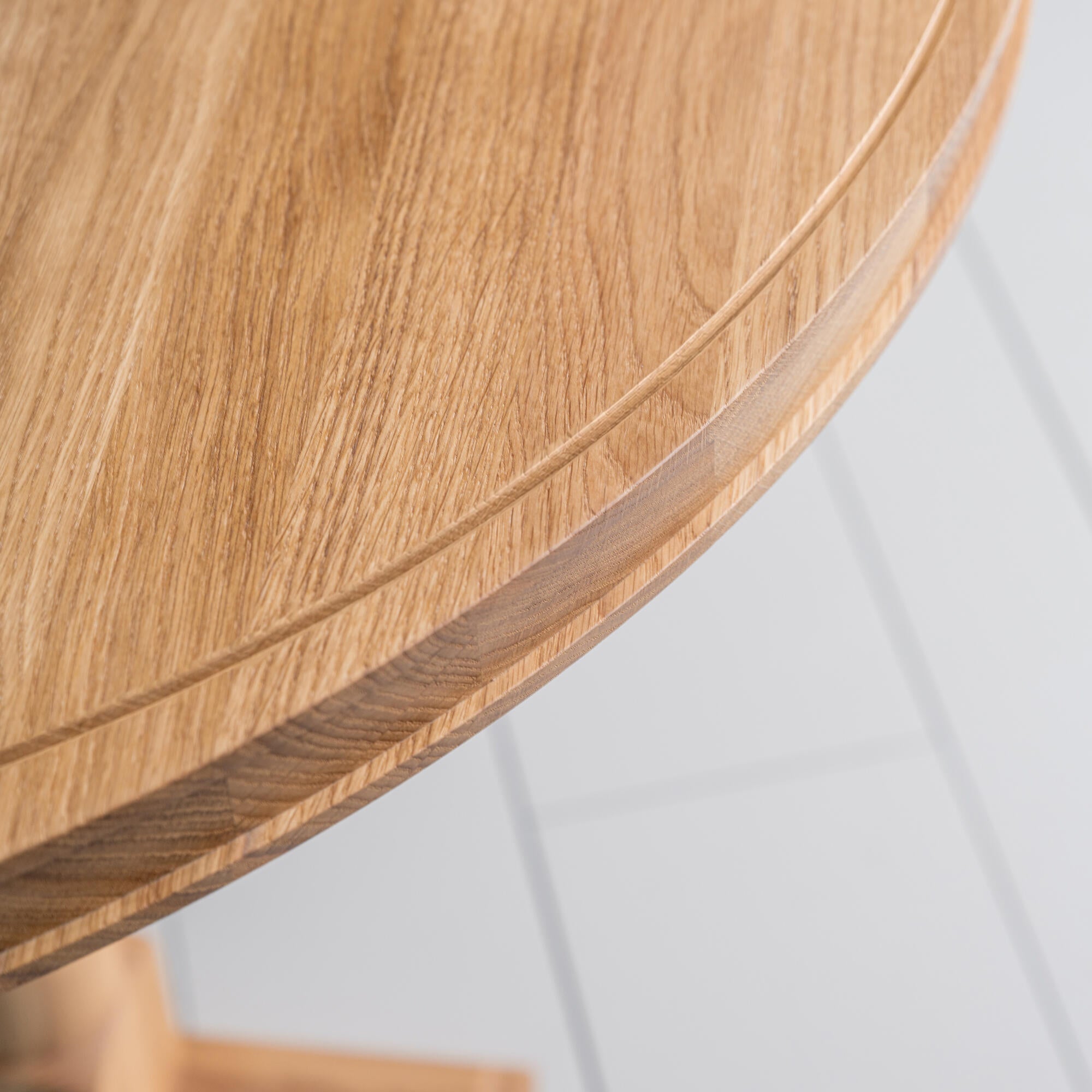  Design Closeup of Tuck In Oval Dining Table in Oak 