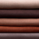 Stack of Linen Fabrics in Multiple Colors Layered Together – By NiX