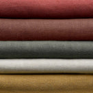 Stack of Linen Fabrics in Multiple Colors Layered Together – By NiX
